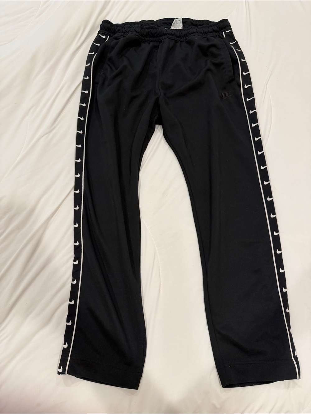 Nike Black Track Pants with White Swoosh Side Tape